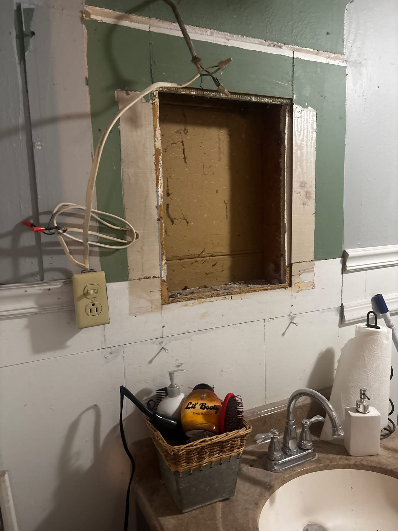 Before — Wall niche transformed with arched cabinet and decorative styling
